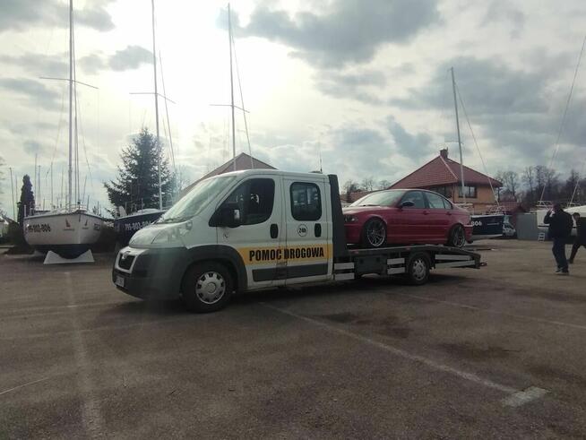 Holowanie pomoc drogowa laweta transport Giżycko Ryn Orzysz