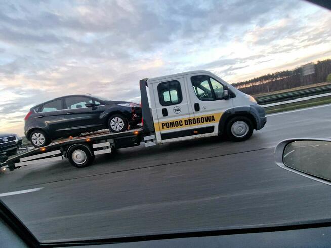 Holowanie pomoc drogowa laweta transport Giżycko Ryn Orzysz