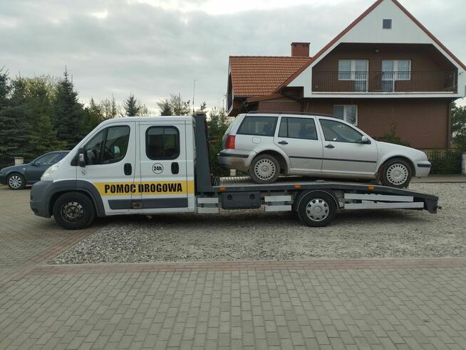 Holowanie pomoc drogowa laweta transport Giżycko Ryn Orzysz