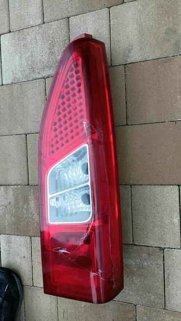 Lampa klosz TYŁ BERLINGO PARTNER 08-12 klapa praw uszko