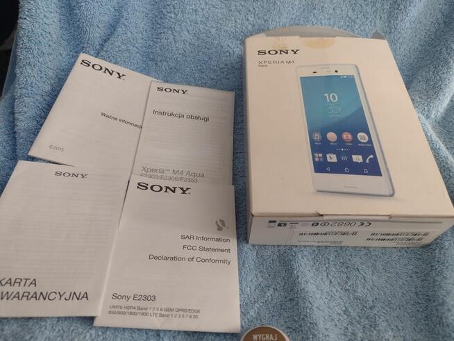 Sony smartfon-komplet.etui, karta startowa nowa, sluch.nowe