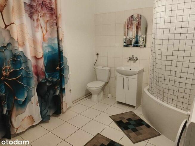 Urokliwy dom z fotowoltaiką i przestronnym ogrodem