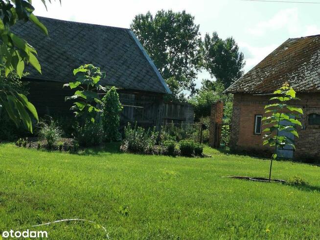 Urokliwy dom z fotowoltaiką i przestronnym ogrodem