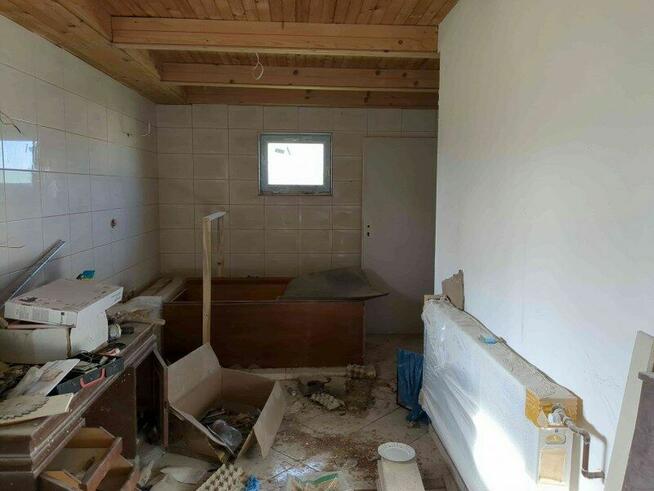 1/6 udziału w nieruchomości zabudowanej - Podkampinos