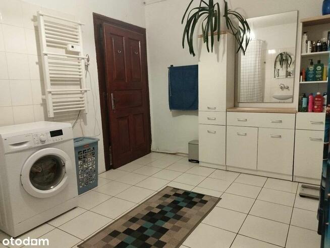 Urokliwy dom z fotowoltaiką i przestronnym ogrodem