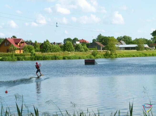 Duża działka z warunkami zabudowy na 5 domów w otulinie lasó