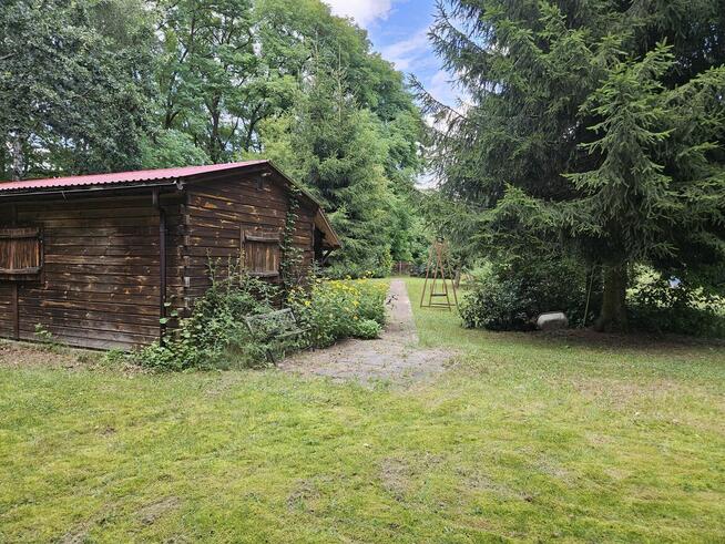 Działka budowlana 1798 m² + domek gospodarczy 37 m²