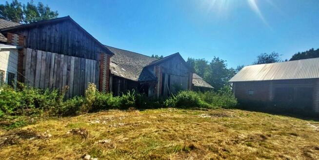 Siedlisko z potencjałem – 0,65 ha działki z zabudowaniami