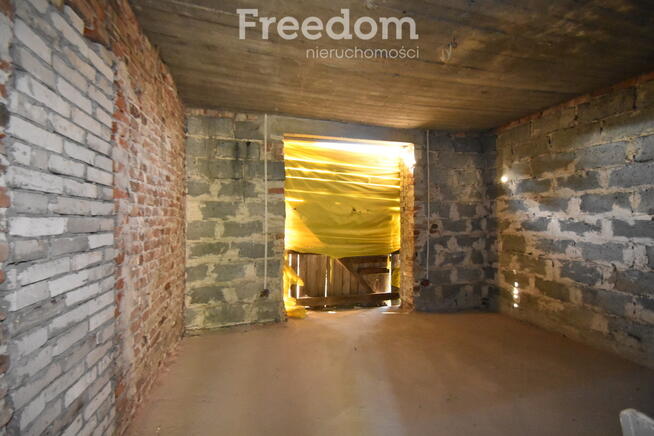 Dom nad rzeką Grabią.