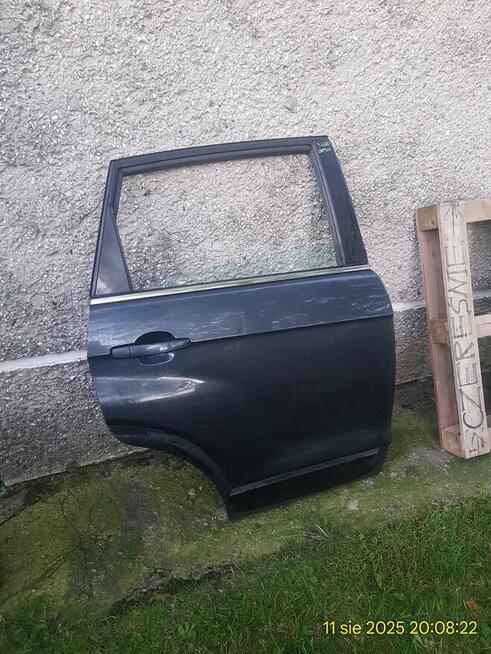Chevrolet Captiva drzwi prawe tylne 2006 r.