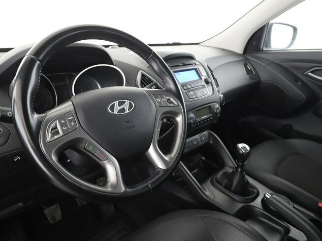 Hyundai ix35 niski przebieg półskóra PDC grzane fotele tempomat klima-auto