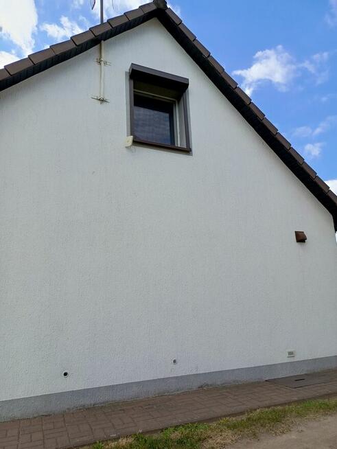 Dom, budynek gospodarczy i dwa garaże