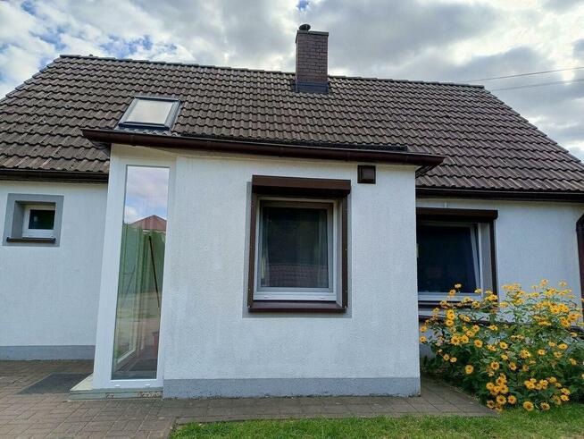 Dom, budynek gospodarczy i dwa garaże