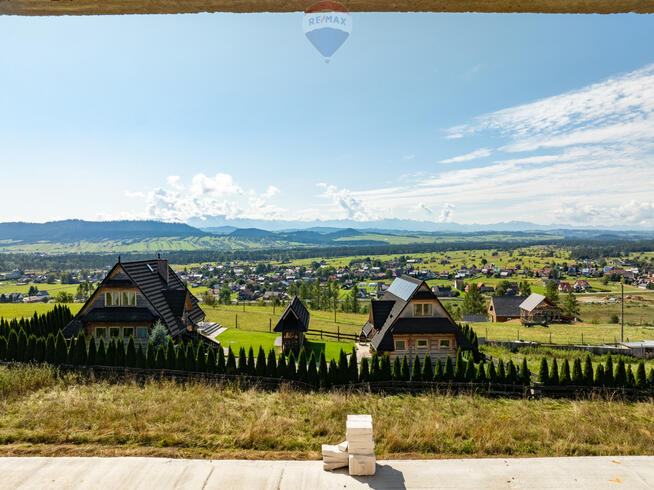 Dom z widokiem na jezioro i Tatry