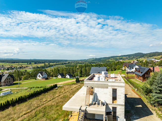 Dom z widokiem na jezioro i Tatry