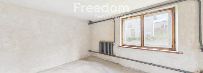 Dom w Olsztynku z budynkiem gospodarczym