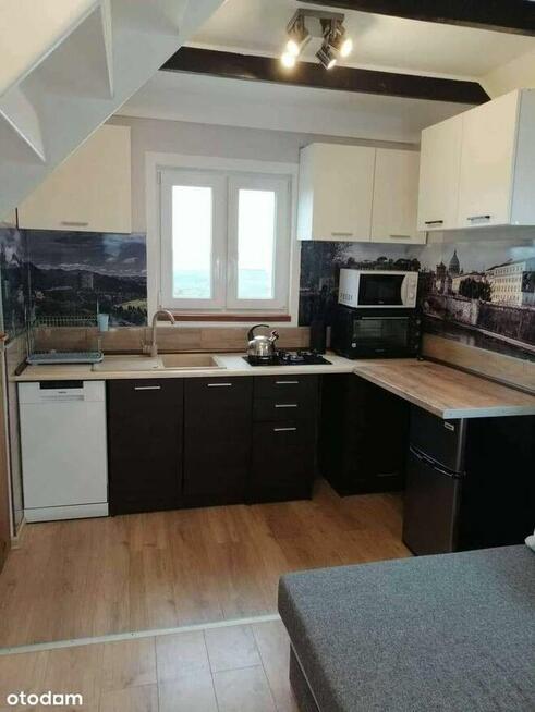 Całoroczny domek w Darłowie – 800 m² działki, 100 m od rzeki