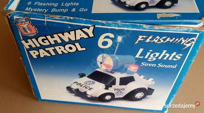 Samochód policyjny zabawkowy z efektem dźwięku i światła