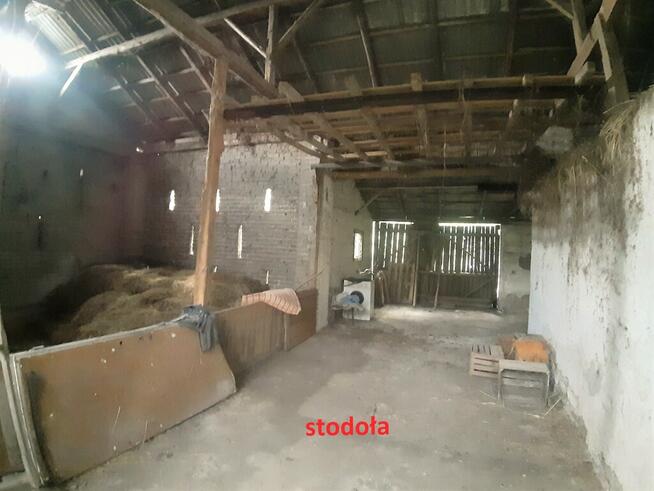 Dom, bud. gospodarcze i 3000m.kw. działki