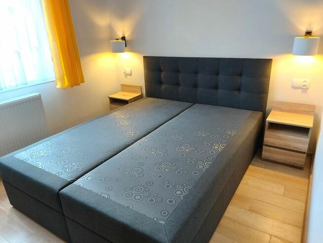 Mieszkanie z ogródkiem na osiedlu senioralnym