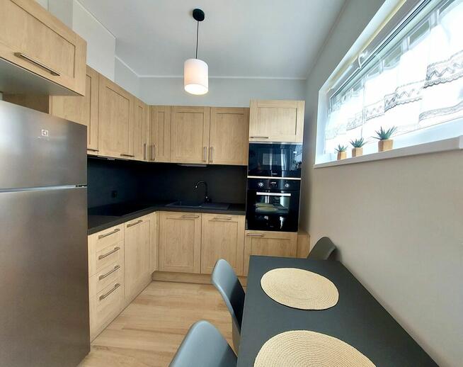 Mieszkanie z ogródkiem na osiedlu senioralnym