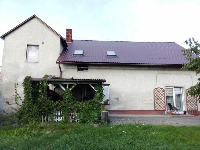 Dom z użytkowym poddaszem na dużej działce z potencjałem