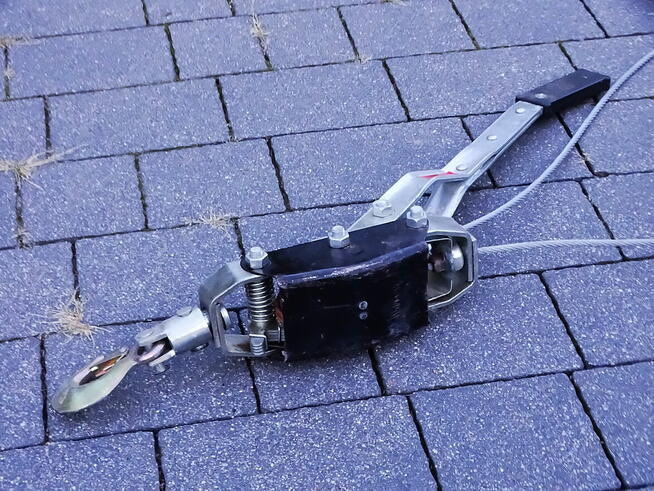 Ręczny naciąg linowy, znany też jako ciągarka linowa lub com