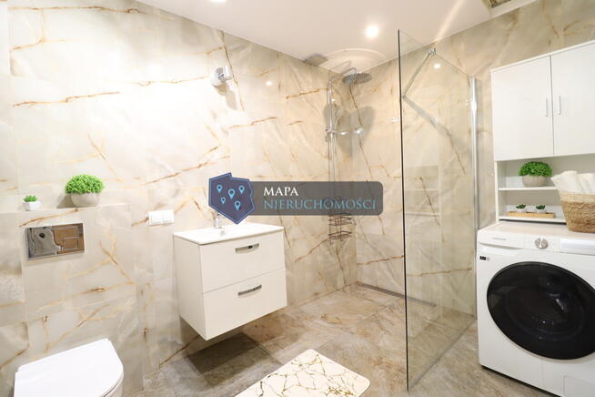 Dwurodzinny dom za miastem z fotowoltaiką