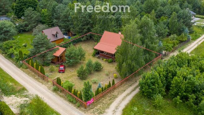 Dwa domki letniskowe nad jeziorem , Szkotowo