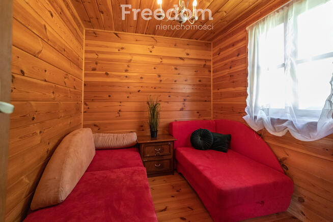 Dwa domki letniskowe nad jeziorem , Szkotowo