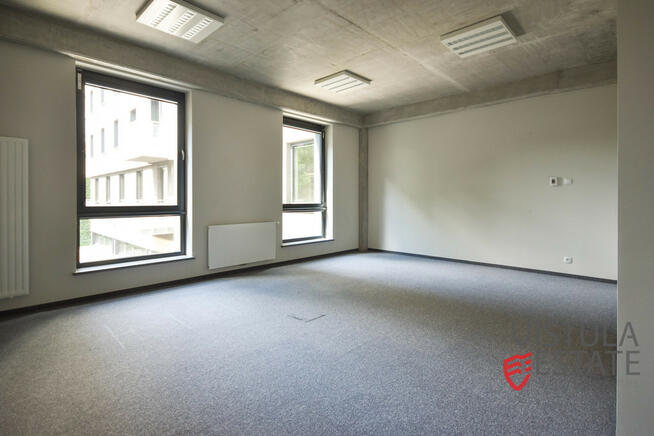 Lokal na pierwszym piętrze biurowca 310 m2