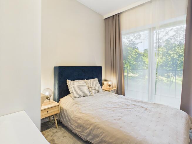 Apartament w Mikołajkach – miejsce postojowe w cenie