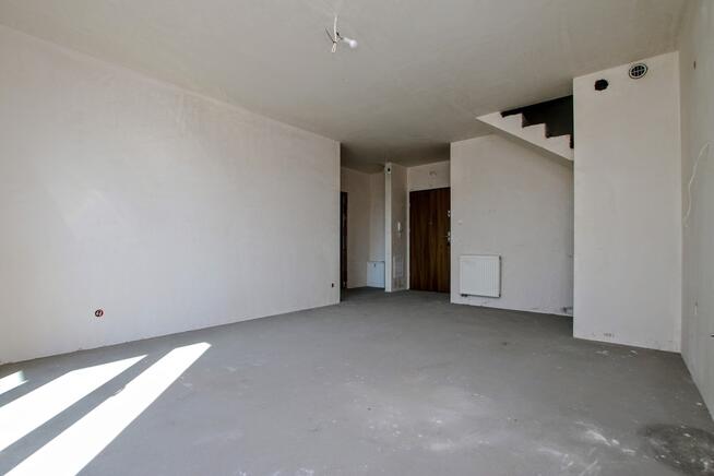 dwupoziomowy apartament w stanie deweloperskim