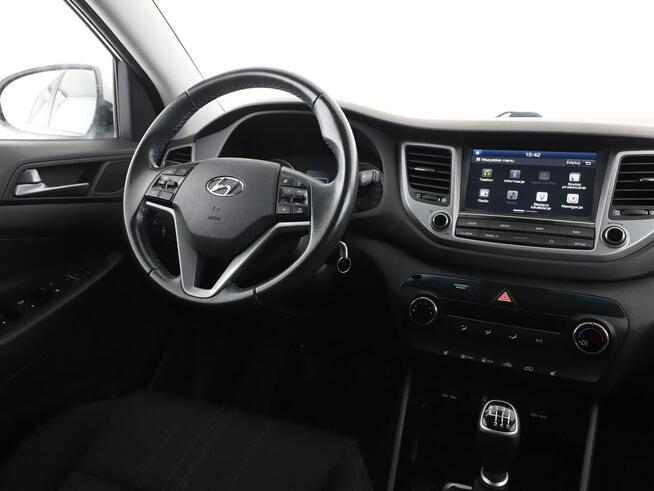 Hyundai Tucson navi klima agrzane fotele kamera i czujniki parkowania