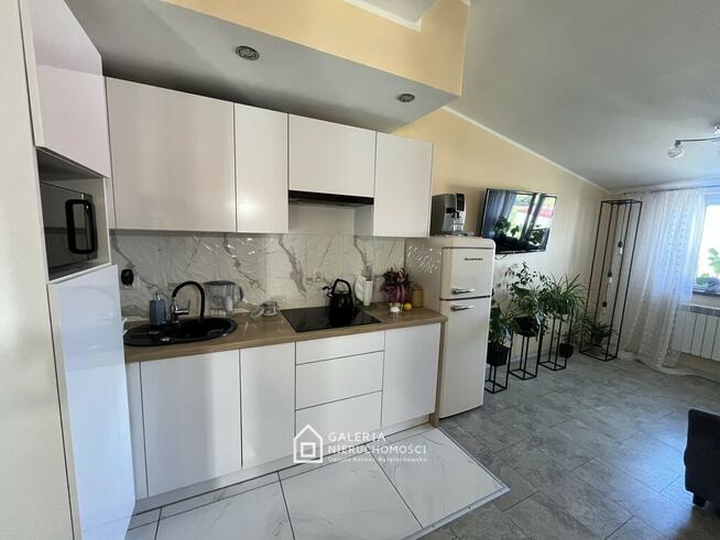 Dwupoziomowy lokal mieszkalny 130 m² z ogrodem