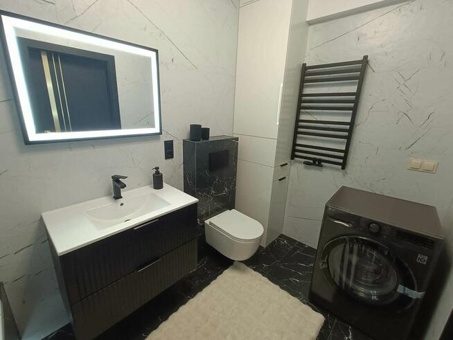 NOWOCZESNE MIESZKANIE 67 m² Z OGRÓDKIEM 48 m² – WYSOKI STAND