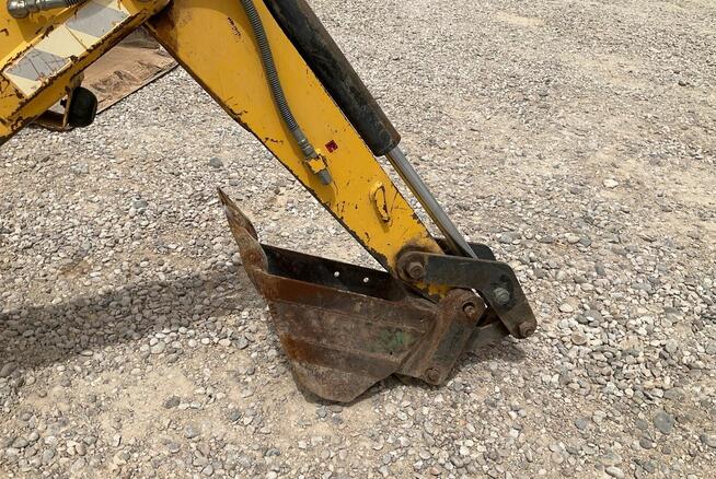 Ładowarka o sterowaniu burtowym Komatsu SK07J z 2001 roku