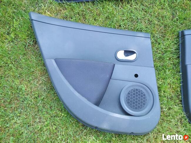 Tapicerka drzwi/Boczki Clio III 5d kpl. 06-12 i inne....