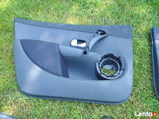 Tapicerka drzwi/Boczki Clio III 5d kpl. 06-12 i inne....