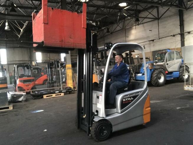 elektryczny wózek widłowy używany Still EXV TRIPLEX maszt