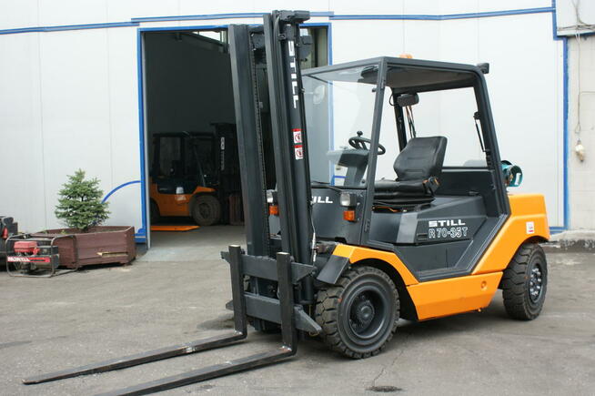 elektryczny wózek widłowy używany Still EXV TRIPLEX maszt