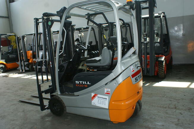 elektryczny wózek widłowy używany Still EXV TRIPLEX maszt