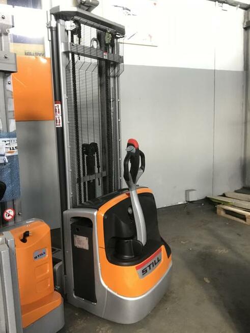 elektryczny wózek widłowy używany Still EXV TRIPLEX maszt