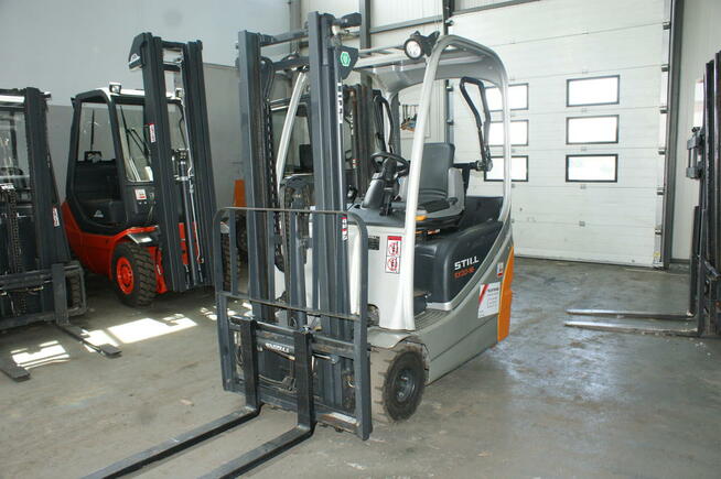 elektryczny wózek widłowy używany Still EXV TRIPLEX maszt