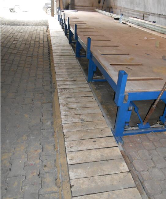 Stół motylkowy do prefabrykacji domów, linia produkcyjna.