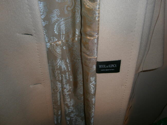 Piękny płaszcz damski ocieplany właśnie na tą porę !!!