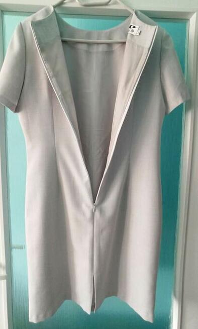 Bardzo ładna elegancka sukienka r.42 jasna - jak nowa