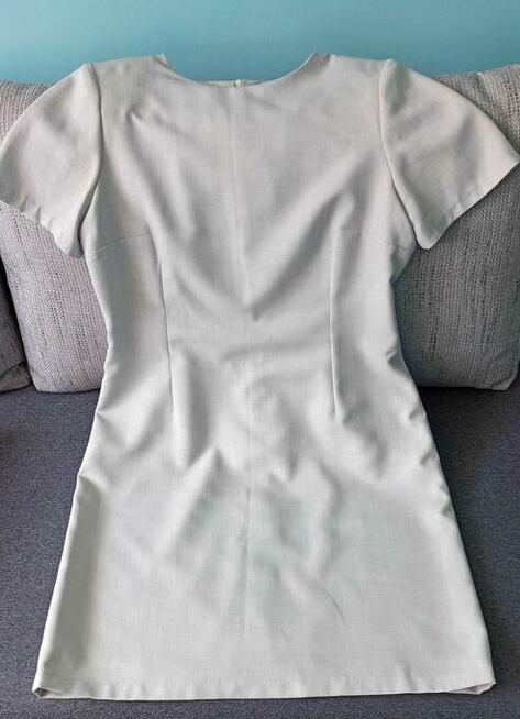 Bardzo ładna elegancka sukienka r.42 jasna - jak nowa