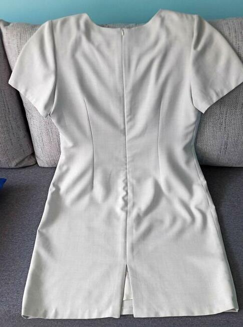 Bardzo ładna elegancka sukienka r.42 jasna - jak nowa