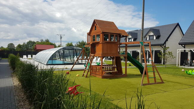 Osada Wypoczynku Jantar - Domki z Basenem, Sauną i Jacuzzi